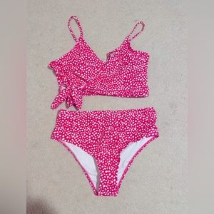 Two piece pink and white poka dot bathing suit
